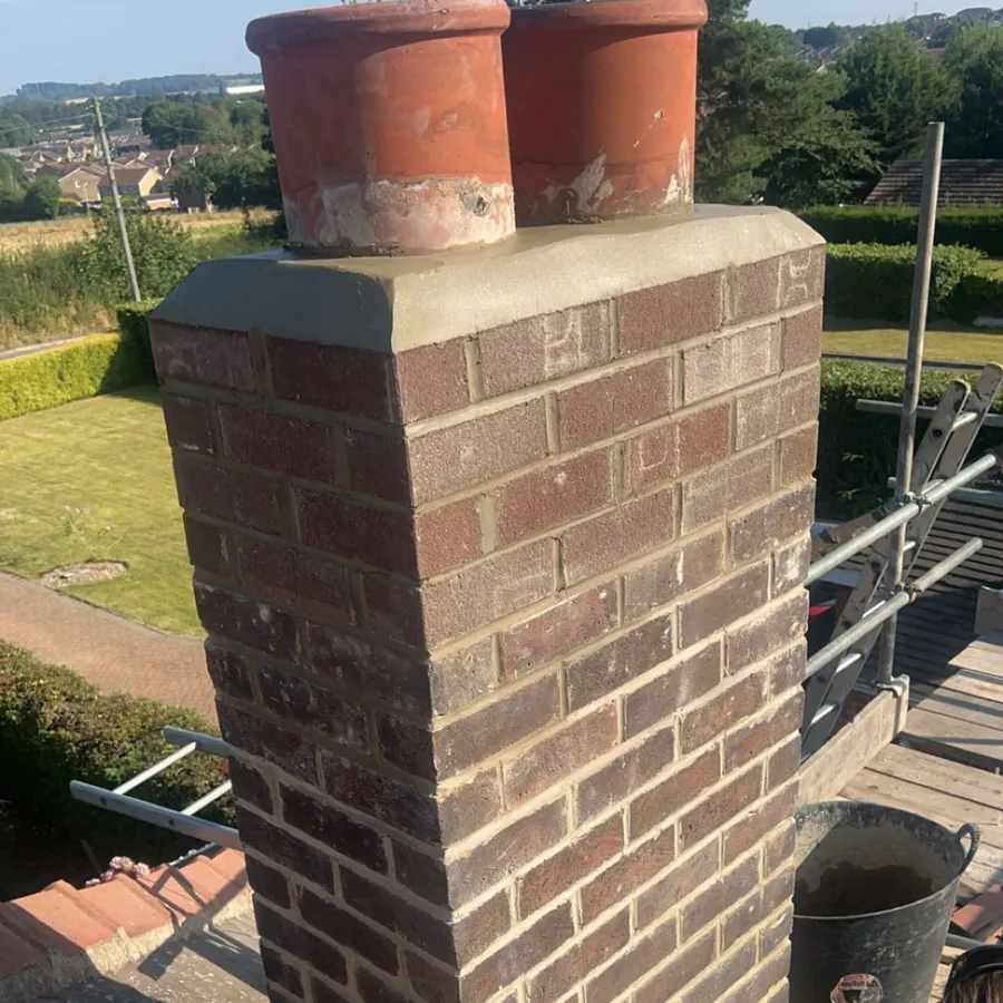 Chimney stack repointed with new pots