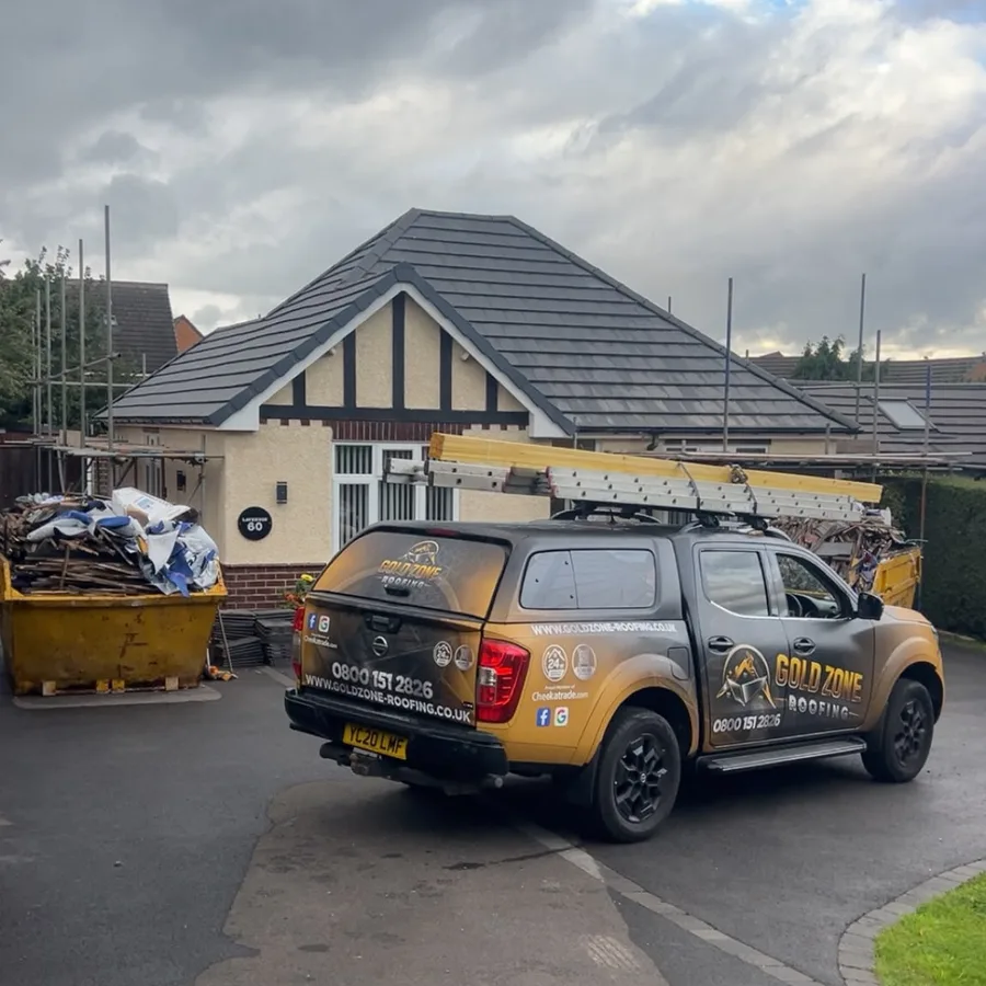 Bungalow re-roof finished, with the Gold Zone van on the drive