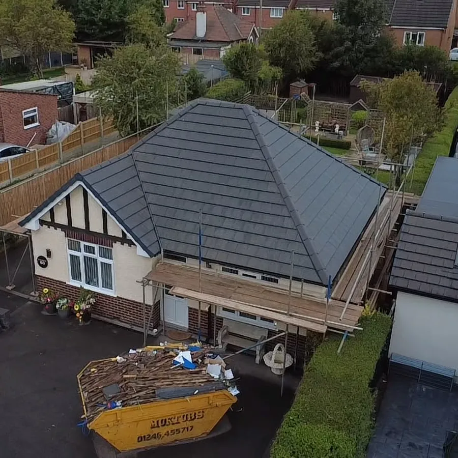 Bungalow re-roof finished, skips ready to go